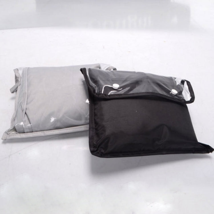 Folded grey and black golf bag rain covers with attached carry pouches