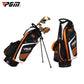 Black golf stand bag with white panels and orange accents, shown with clubs holder.