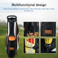 Black golf stand bag with white side panel and orange loop-style handle detail.
