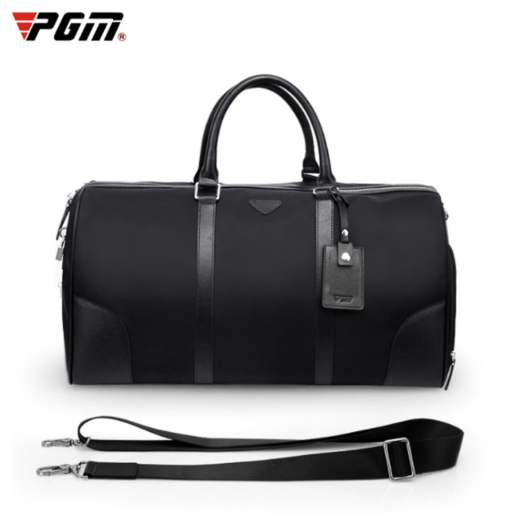 Black nylon duffel-style clothing bag with top handles and side compartments