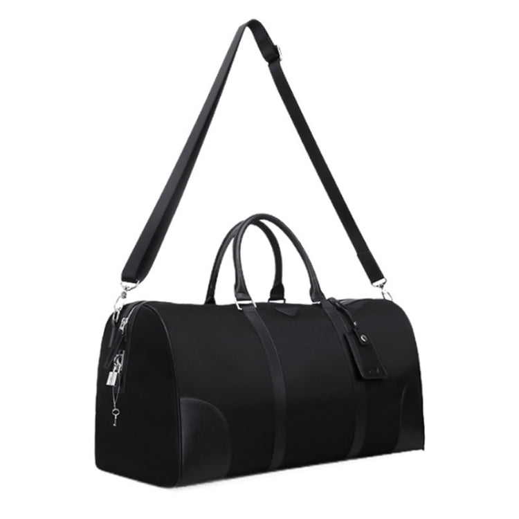 Black nylon duffel bag with long shoulder strap and short carry handles