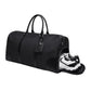 Black nylon clothing bag with open shoe pocket and sneakers inside