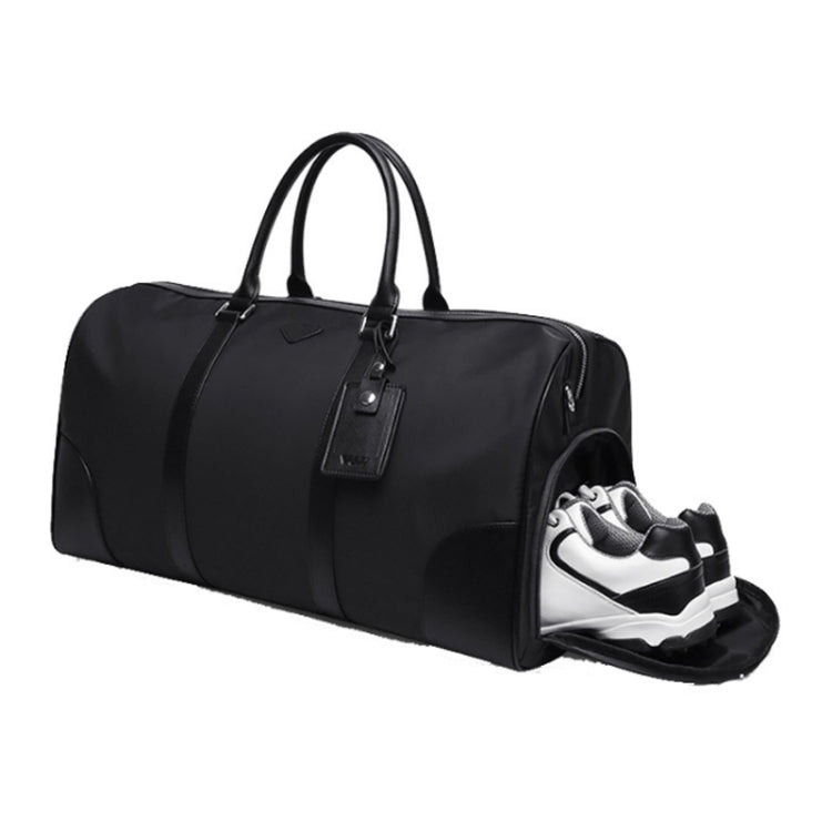 Black nylon clothing bag with open shoe pocket and sneakers inside
