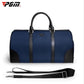 Blue nylon duffel-style clothing bag with top handles and adjustable shoulder strap