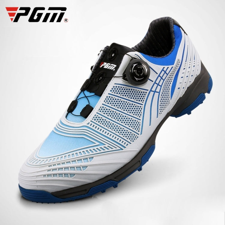 White golf lace-up sneakers with black buckle knob, blue accents, and blue traction sole