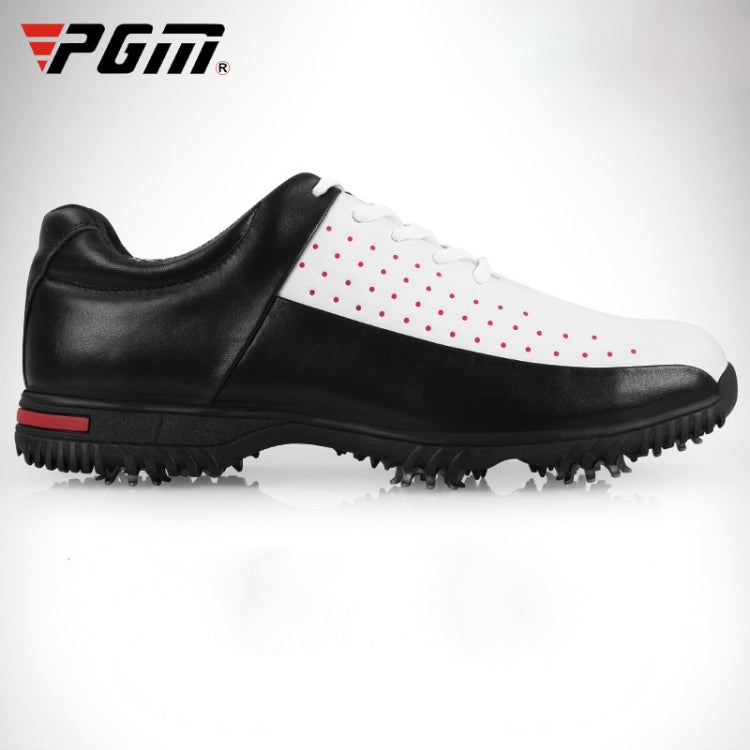Men's golf sneaker side profile with lace-up closure, black leather-look upper and white dots
