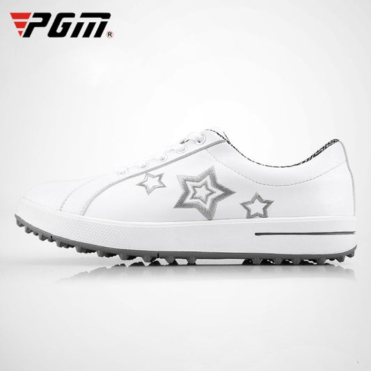 White women’s golf sport shoes with lace-up front and silver star details