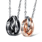 Pair of interlocking ring pendants in black and rose gold with silver link chains