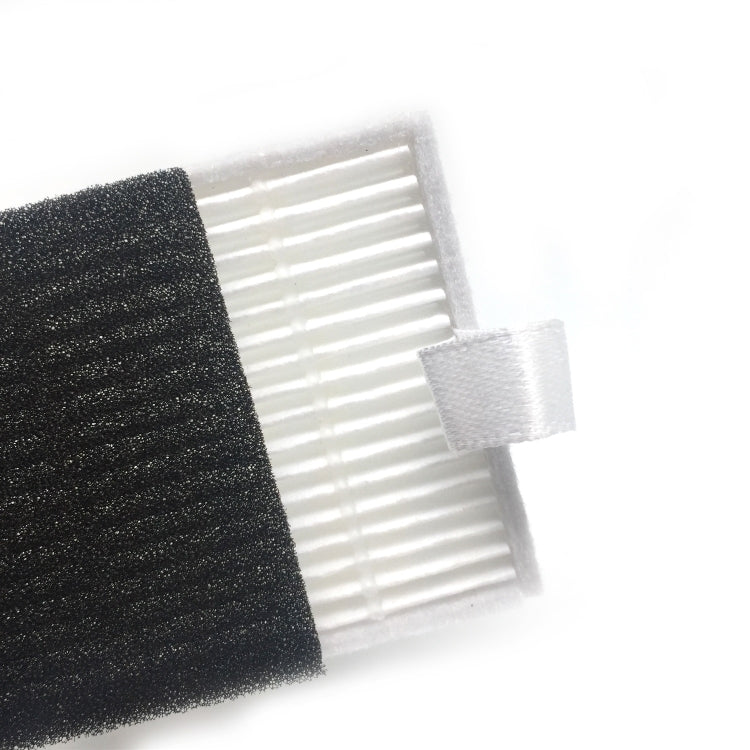Replacement vacuum filter close-up: black foam with white pleated ribs