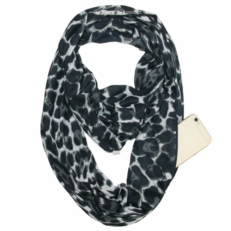 Leopard print infinity scarf, black and gray leopard pattern with red accents, looped