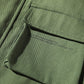 Olive green interior-style pocket with stitched panel and flap edge