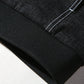 Black denim jacket cuff/hem ribbing with contrast seam stitching