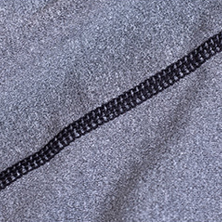 Black stitched piping detail on heather gray stretchy fabric