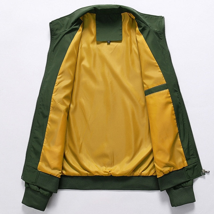 Men's zip-up stand-collar jacket interior, showing yellow lining under green shell.