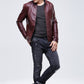 Maroon PU leather jacket worn by model, zip front, stand collar, side pockets