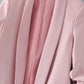 Women’s light pink blazer jacket fabric detail with pleated texture