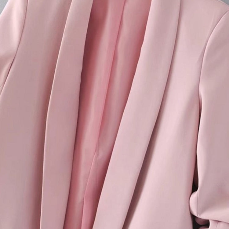 Women’s light pink blazer jacket fabric detail with pleated texture