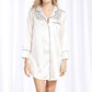 White silk pajama nightgown with black-trim notch collar, button front, chest pocket