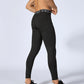 Black compression running tights with contoured seams and stretch fit