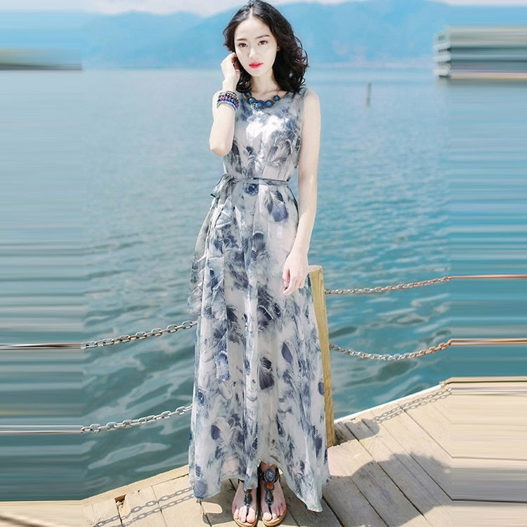 Blue-and-white abstract print sleeveless maxi dress with scoop neck and fitted bodice